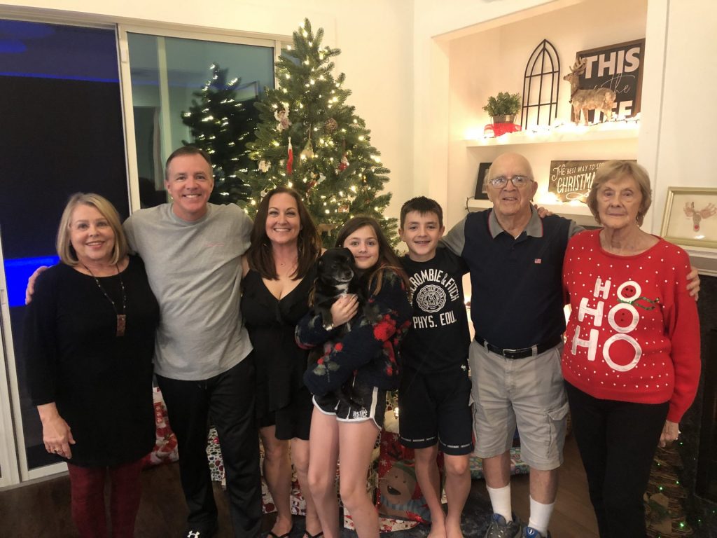 Duncan Family in front of Christmas tree